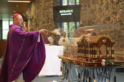 Bishop Anthony Randazzo Incensing Relics of Ss 