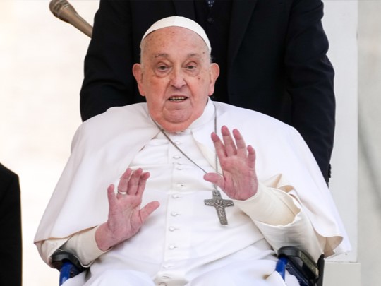 0414pope-Pope-Francis-greets-the-faithful-as-he-makes-a-surprise-appearance-in-St-Peter-s-Square-yesterday-CNS-Lola-Gomez