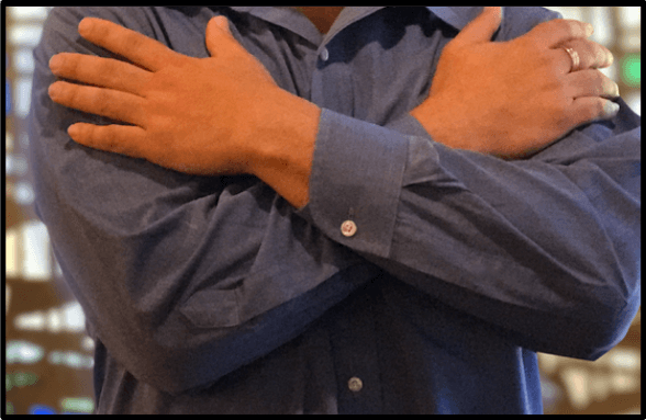 Arms crossed for blessing